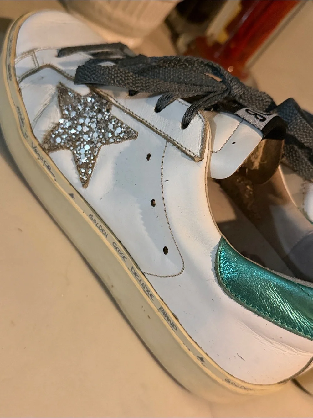 Golden Goose white leather sneakers with teal heel tabs fits 71/2